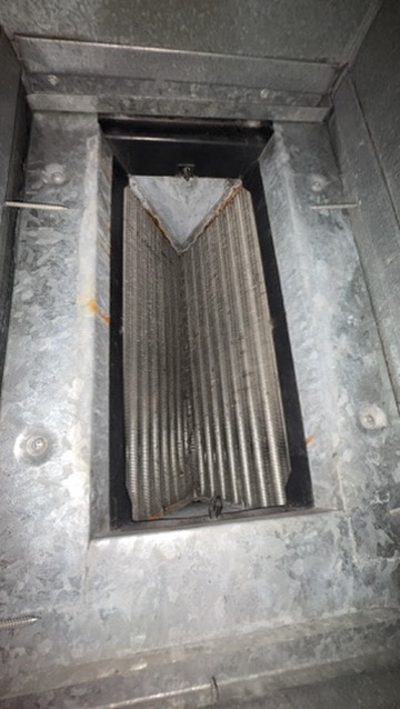 The same evaporator coil clean and clear after a professional cleaning in a Niles, MI area home