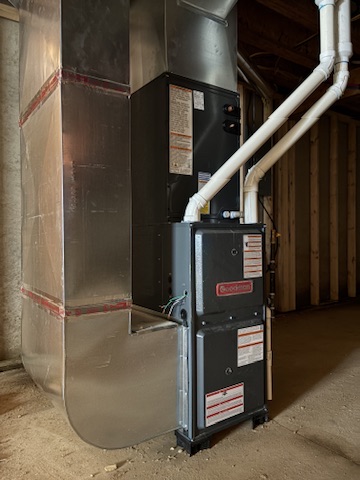 A Goodman furnace connected to new sheet-metal ductwork in a Niles, MI area home